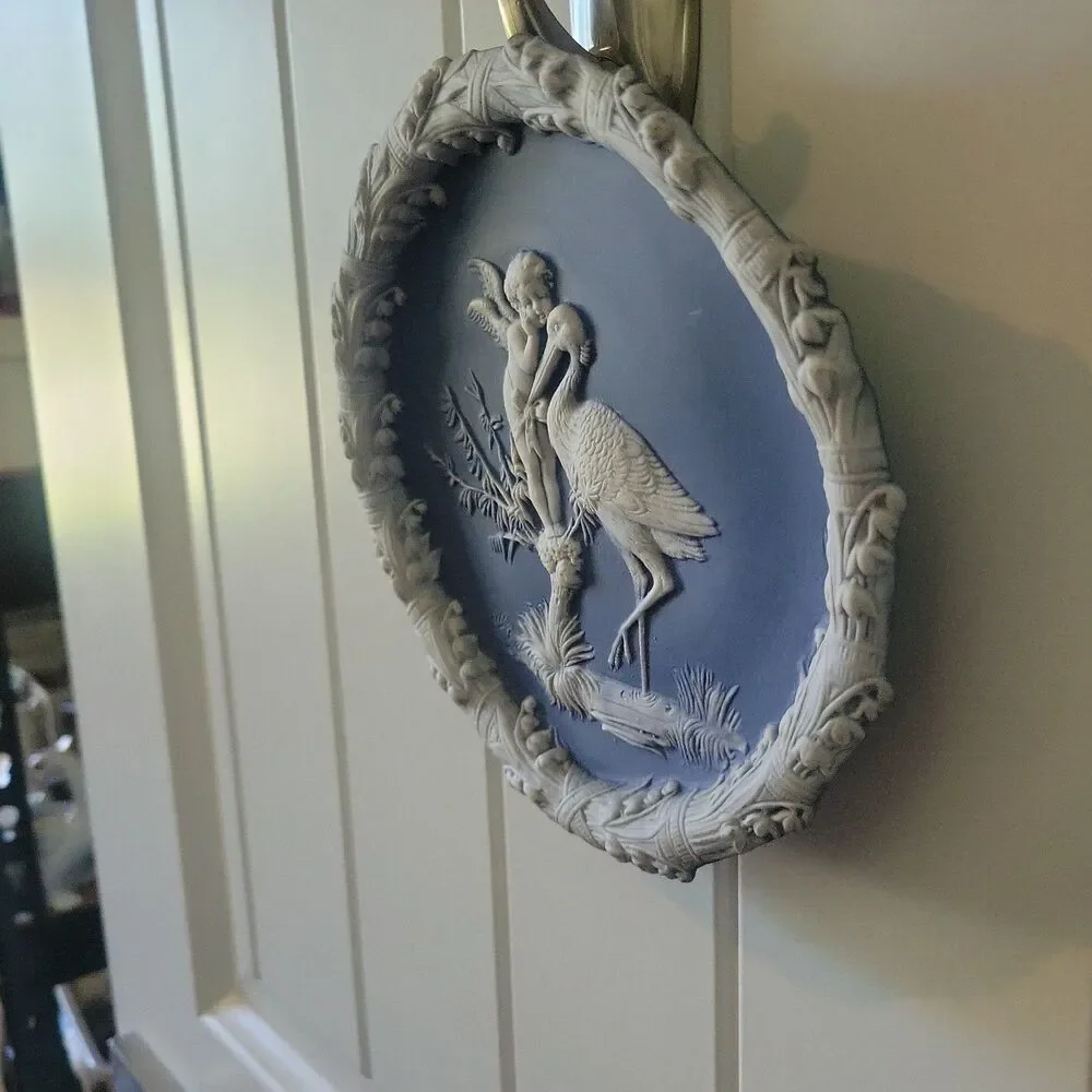 Schafer & Vater Blue & White Jasperware Plaque Featuring a Cherub & Stork Lily